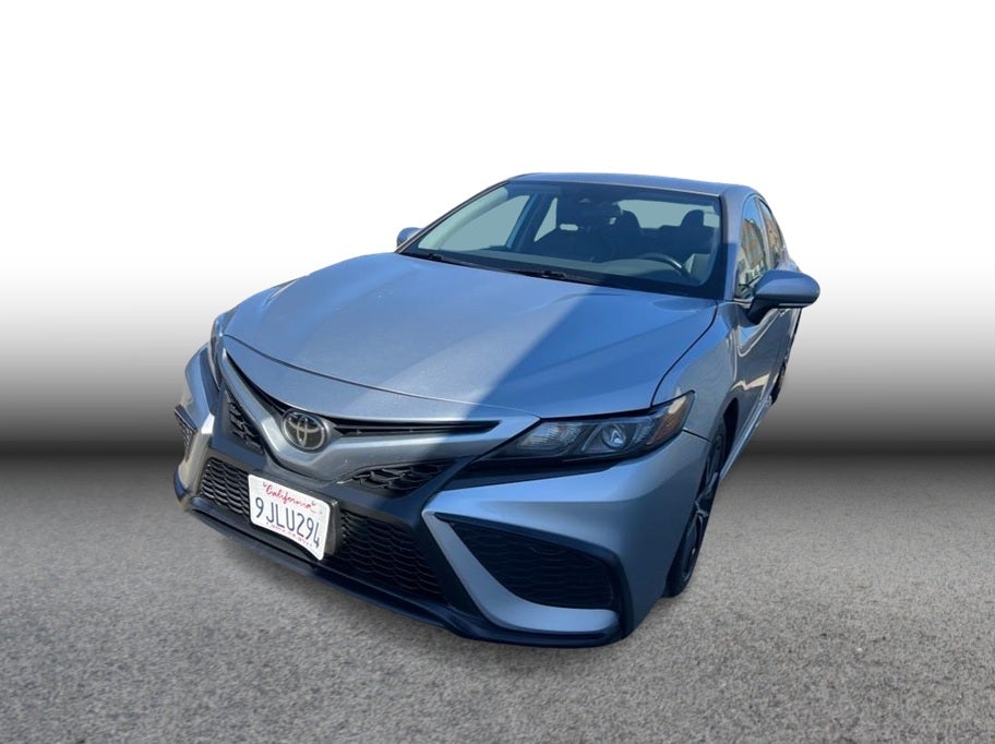 2024 Toyota Camry SE Sedan 4D in Silver — front three-quarter view