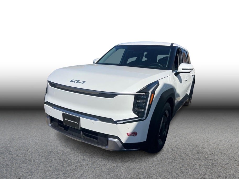 2024 Kia EV9 Light Long Range Sport Utility 4D in White — front three-quarter view