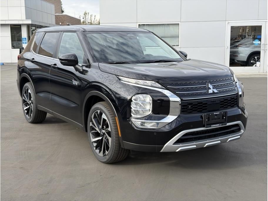 2025 Mitsubishi Outlander PHEV — rear three-quarter view