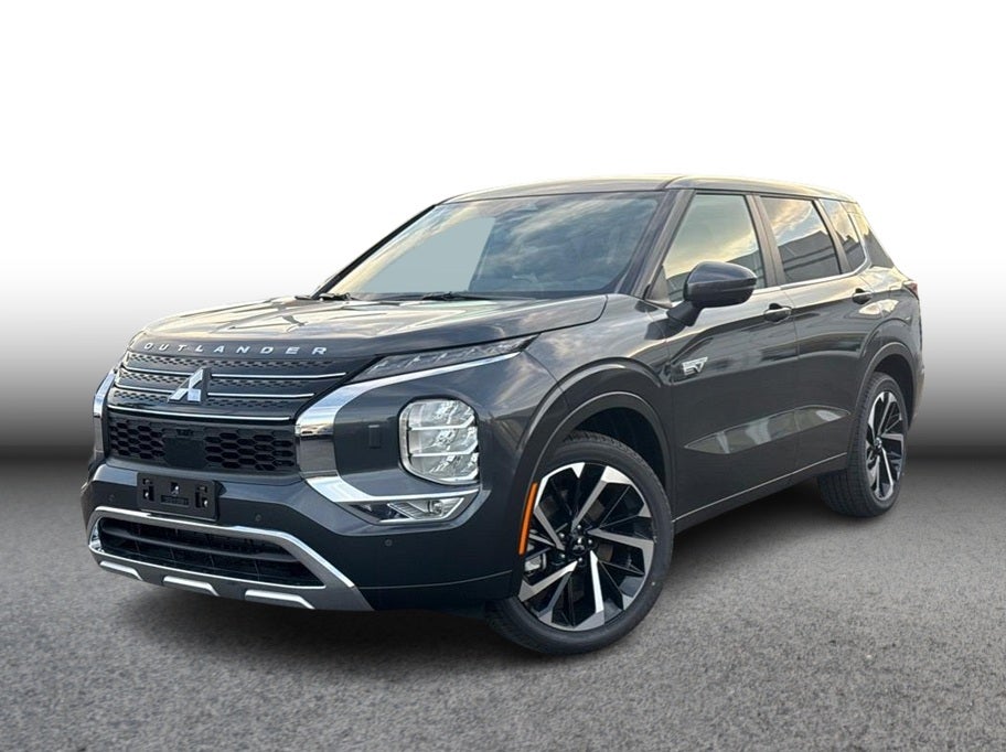 2025 Mitsubishi Outlander PHEV SE in Gray — front three-quarter view