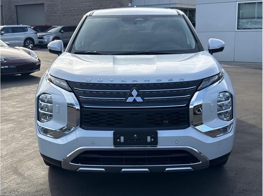 2025 Mitsubishi Outlander PHEV — rear three-quarter view