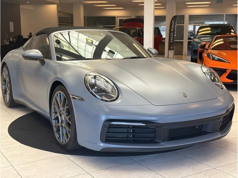 2024 Porsche 911 — rear three-quarter view