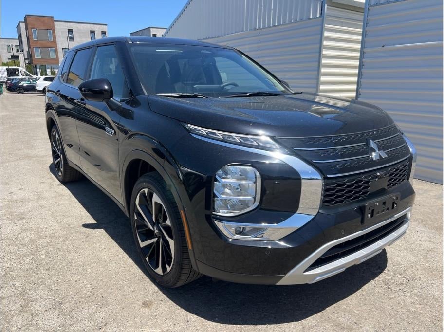 2025 Mitsubishi Outlander PHEV — rear three-quarter view