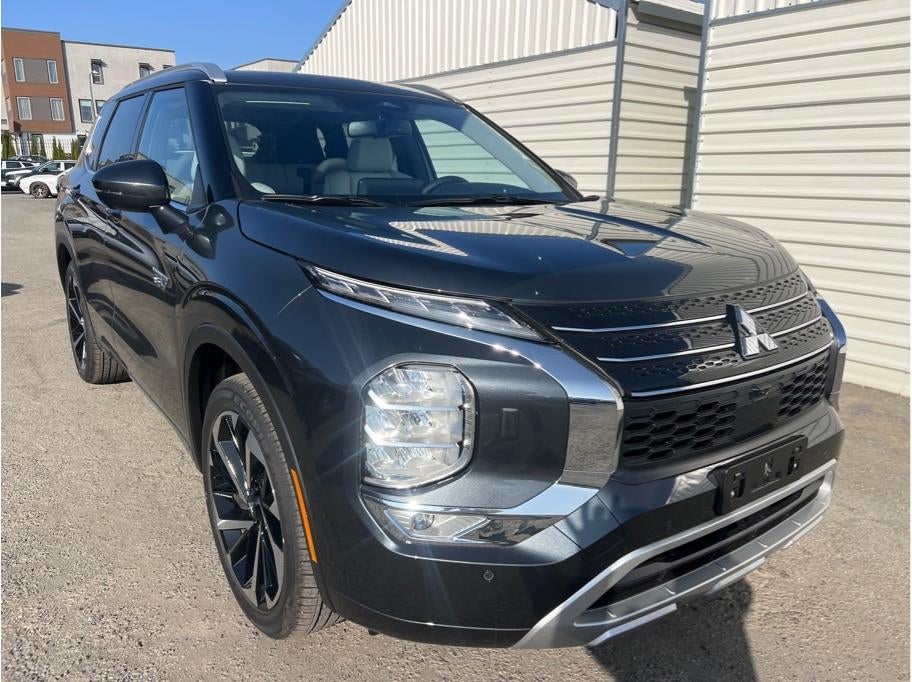 2025 Mitsubishi Outlander PHEV — rear three-quarter view
