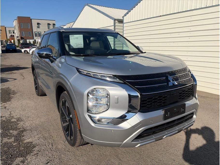 2025 Mitsubishi Outlander PHEV — rear three-quarter view