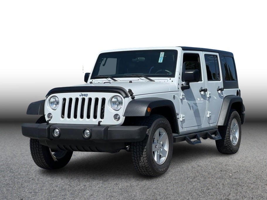 2017 Jeep Wrangler Unlimited Sport S Sport Utility 4D in White — front three-quarter view