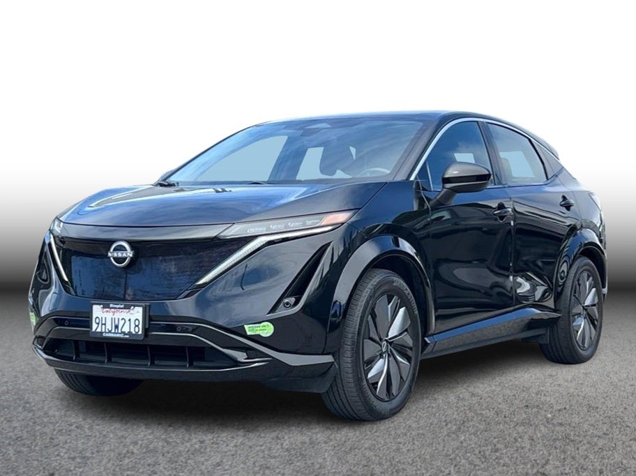 2023 Nissan ARIYA Engage Sport Utility 4D in Black — front three-quarter view