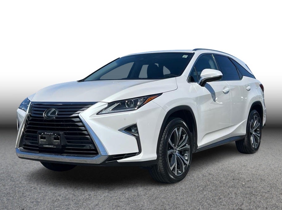 2019 Lexus RX RX 350L Sport Utility 4D in White — front three-quarter view
